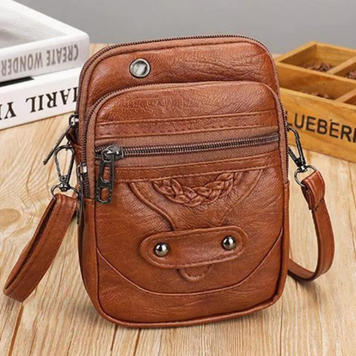 Laura™ | Geprägte Lederhandtasche