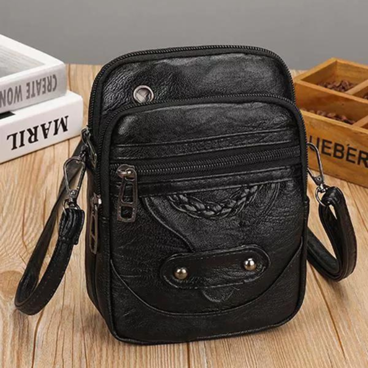 Laura™ | Geprägte Lederhandtasche