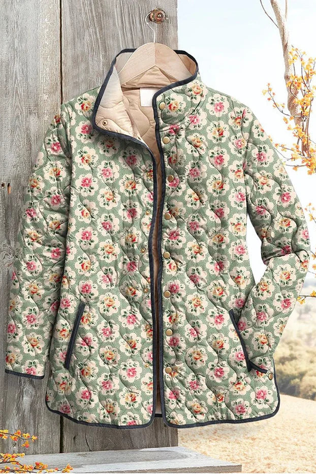 Aurelia – Steppjacke mit blumigem Print und Kontrastpaspeln